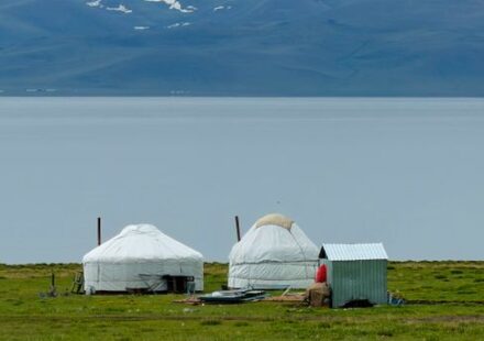 Yurt camp beside an alpine lake in Kyrgyzstan