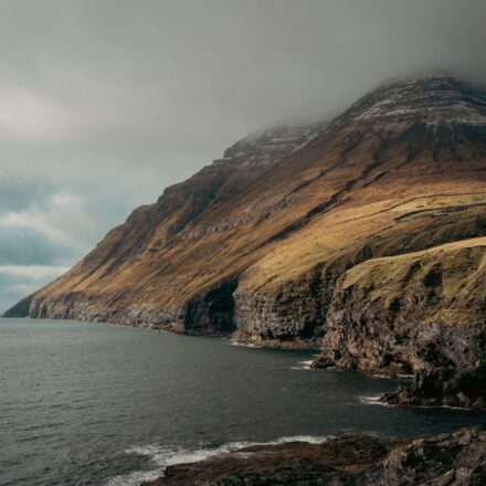 Green sea cliffs dropping into the North Atlantic